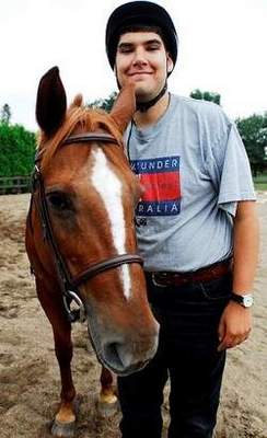 Makhoul hugs horse