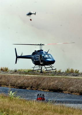 Helicopters fighting Florida fir