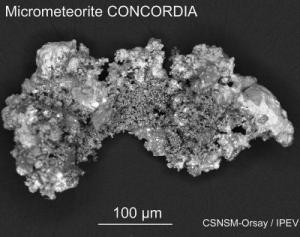Click to enlarge micrometeorite