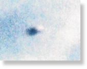 Click to enlarge UFO following Hercules Plane