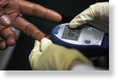 A petient has blood sugar readings taken.