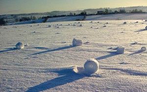 self-rolling snow balls