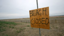 oil spill beach closed