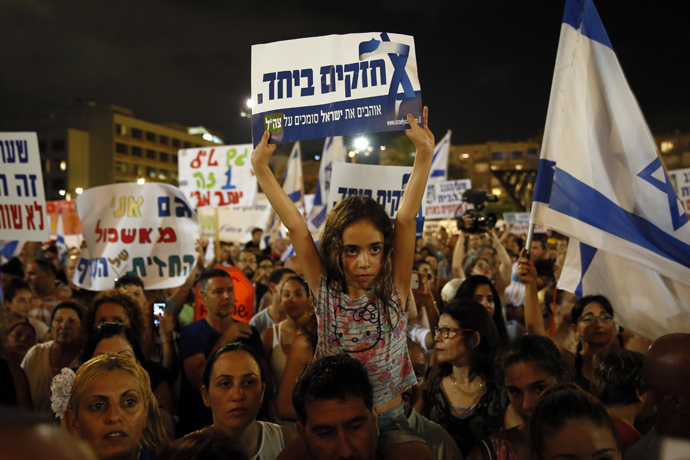 Israelis gather during a protest