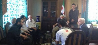 Click to enlarge McCain and Ibrahim al-Badri