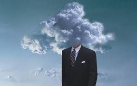 man in suite cloudy head