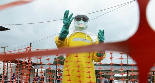 Click to enlarge ebola health worker