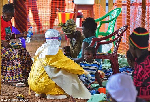 Click to enlarge Medic and ebola child