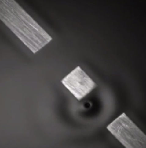 Click to enlarge double slit droplet experiment