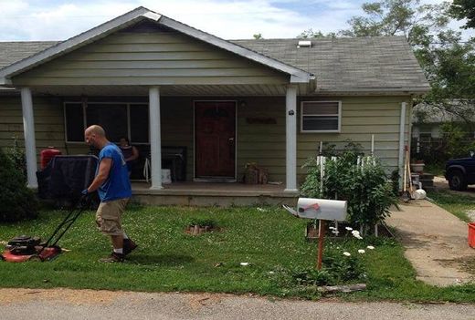  resident mows his lawn