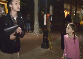 Click to enlarge little girl yelling_street preacher