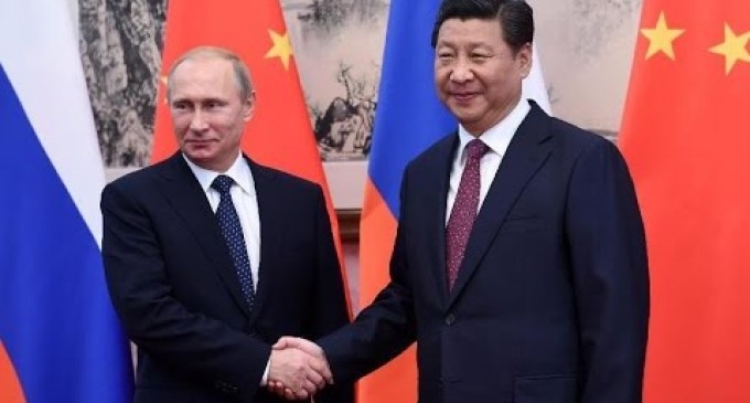 Click to enlarge Presidents Vladimir Putin and Xi Jinping