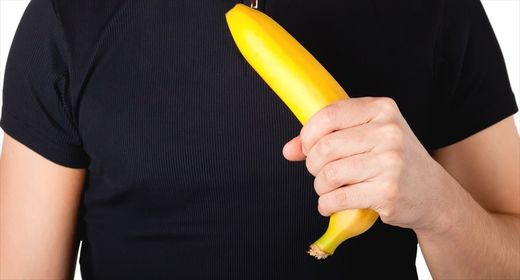 man holding banana