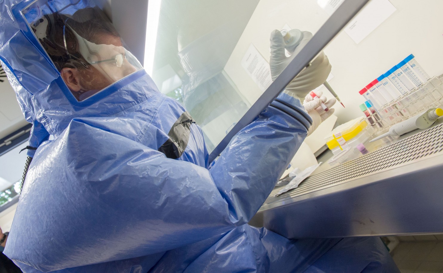 Click to enlarge lab worker