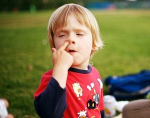 kid picking nose