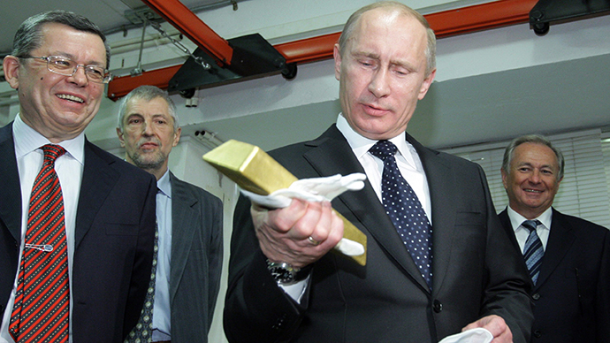 Putin holding gold