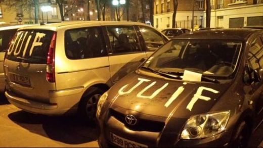 Serial complainer about anti-Semitic graffiti left on and near his home in Paris... caught daubing cars with anti-Semitic graffiti