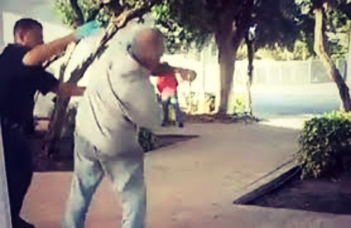 cop slaps man