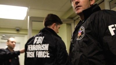 Click to enlarge FBI agents