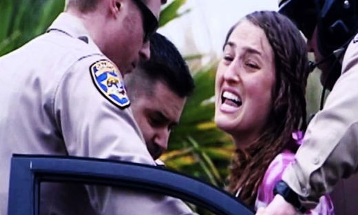 Erica May Carey being arrested 