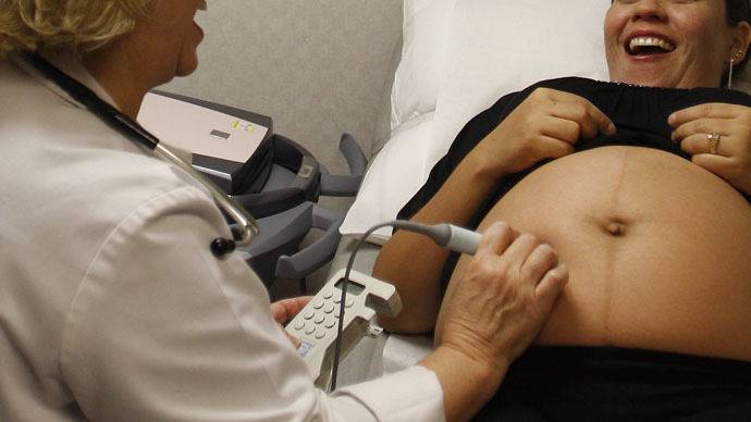 Click to enlarge pregnant woman