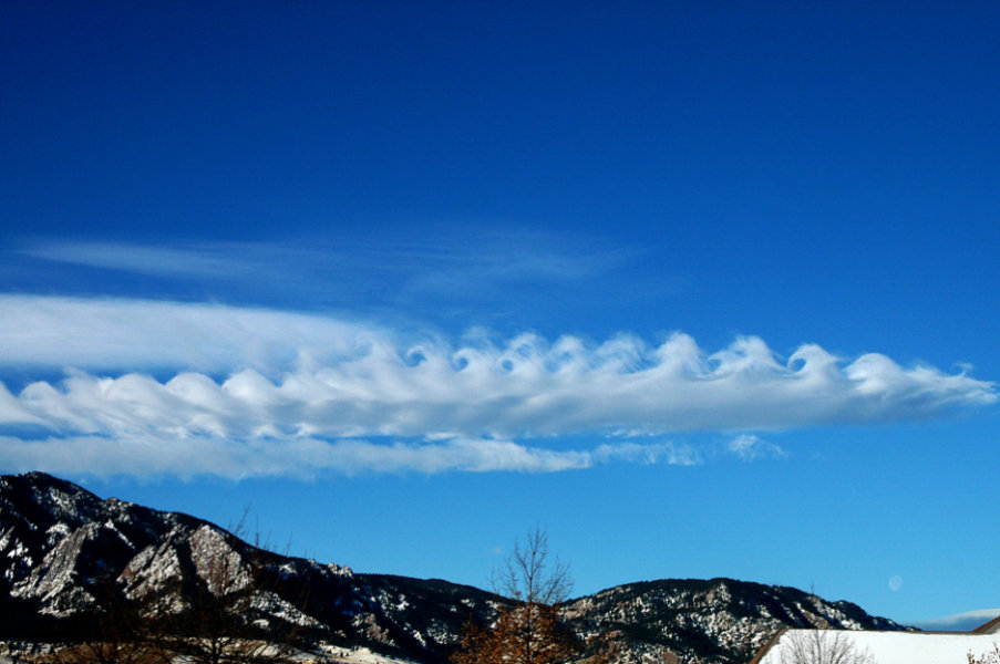 Click to enlarge 'breaking waves' clouds