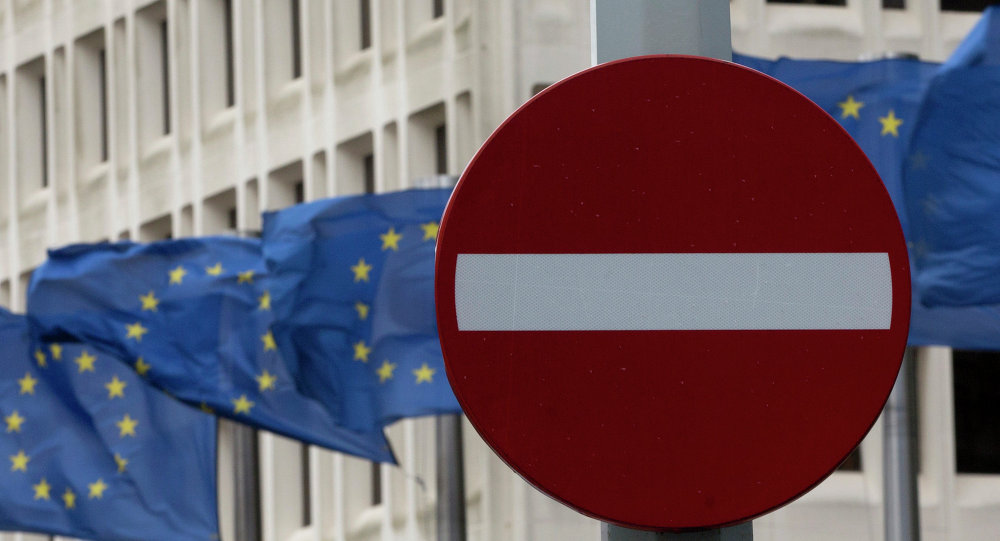No entry sign in front of EU flags