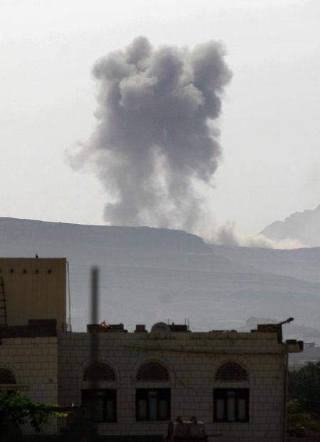 Click to enlarge smoke from air-strike in Sanaa, Yemen