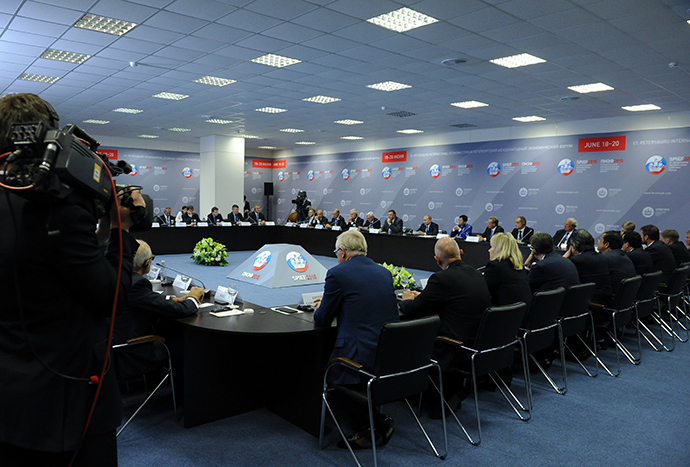 Click to enlarge Vladimir Putin during a working lunch