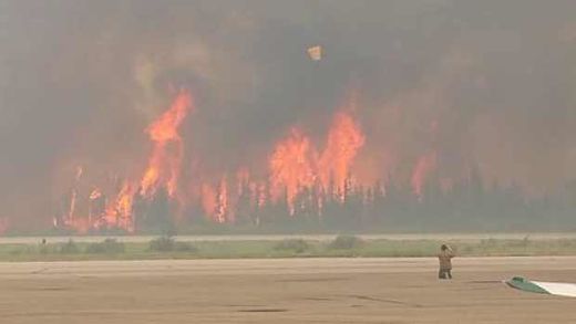 Click to enlarge wildfire at La Ronge airport