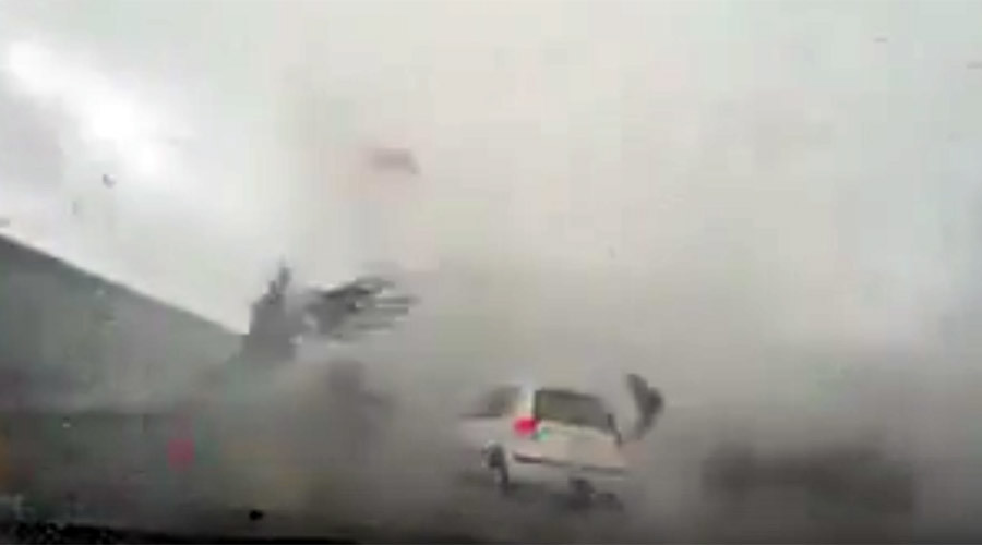 typhoon overturns car in Taiwan