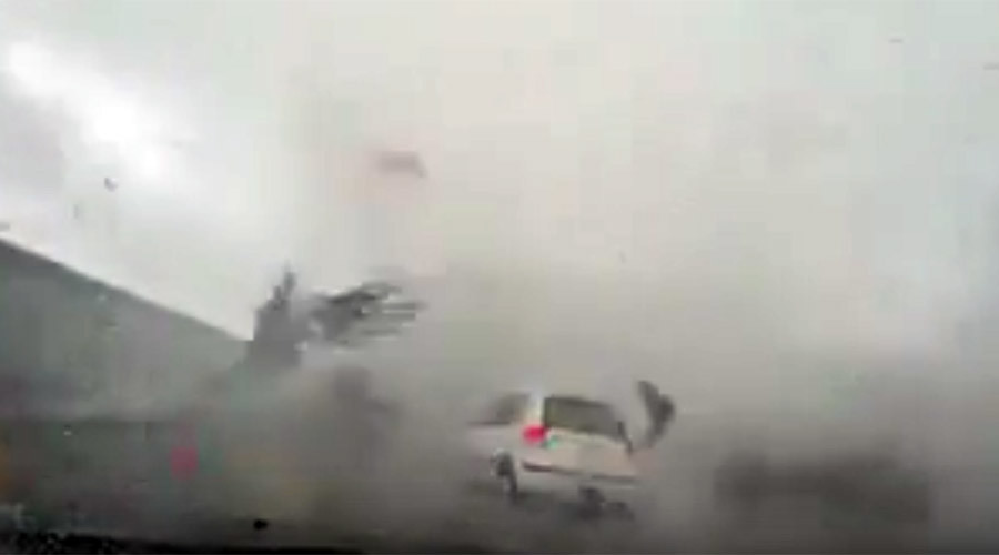 typhoon overturns car in Taiwan