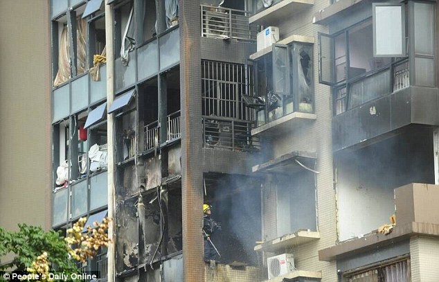 Click to enlarge Blaze at residential building in Chengdu, China