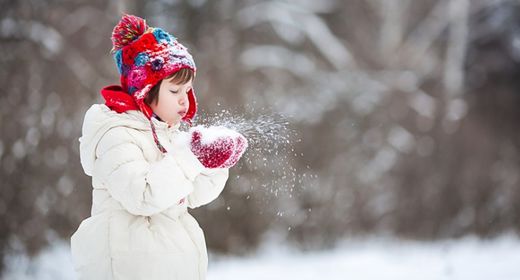 Click to enlarge girl blowing snow