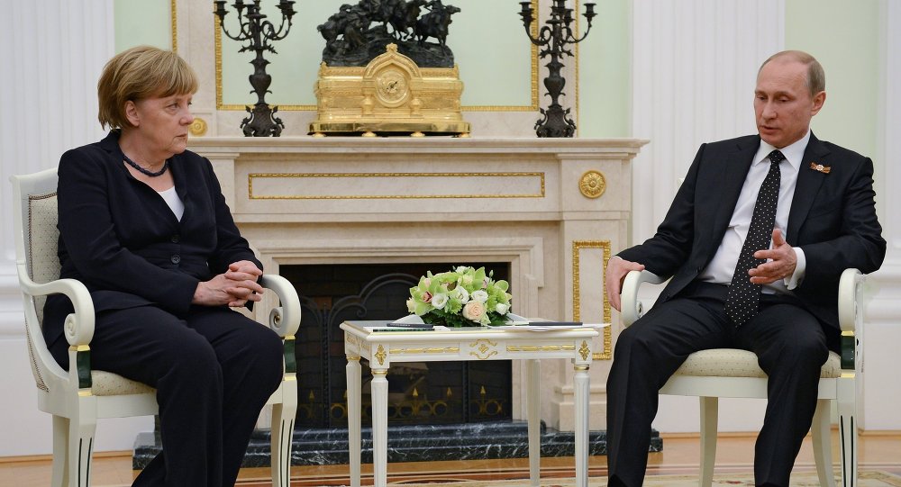 Putin Merkel