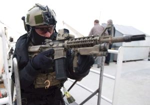 Click to enlarge soldier with machine gun