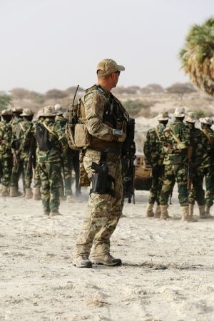 Click to enlarge Camouflaged soldiers