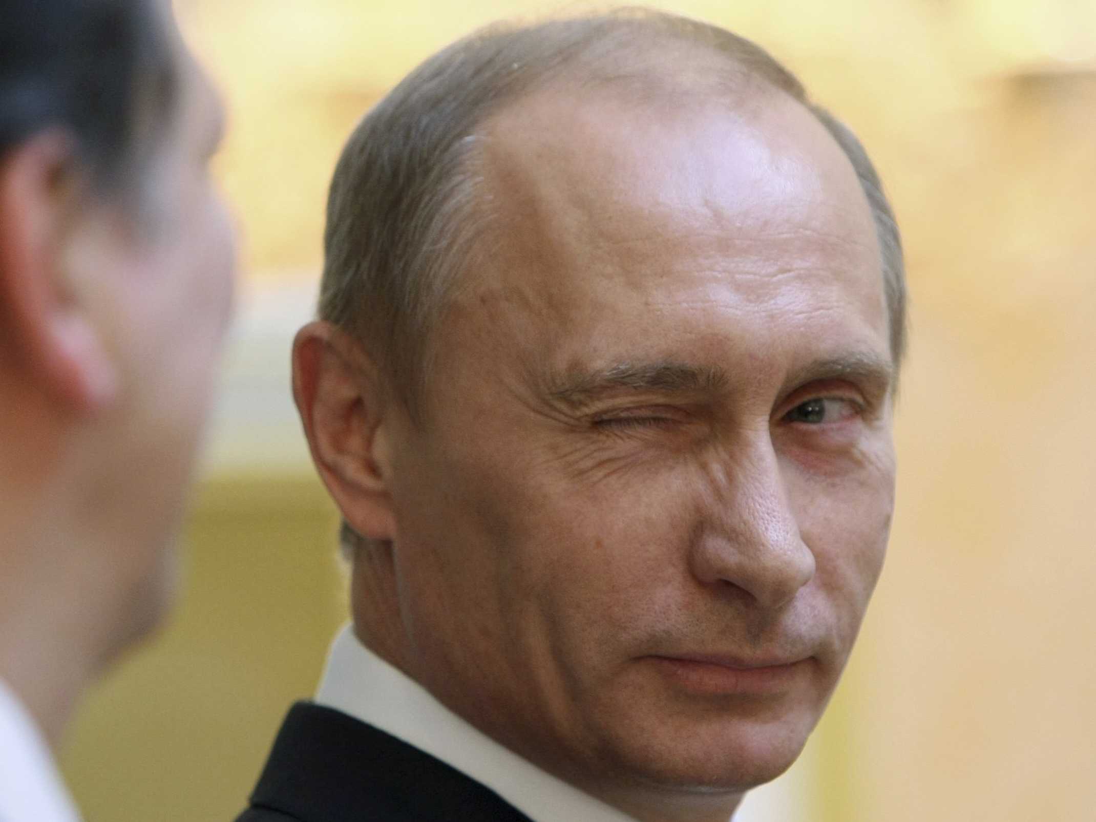 Click to enlarge Putin wink