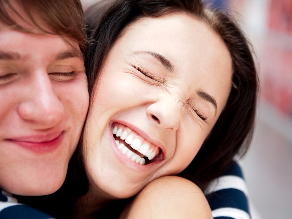 Click to enlarge Two happy people hugging