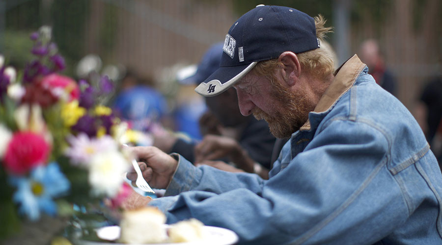 homeless man eating at wedding banquet