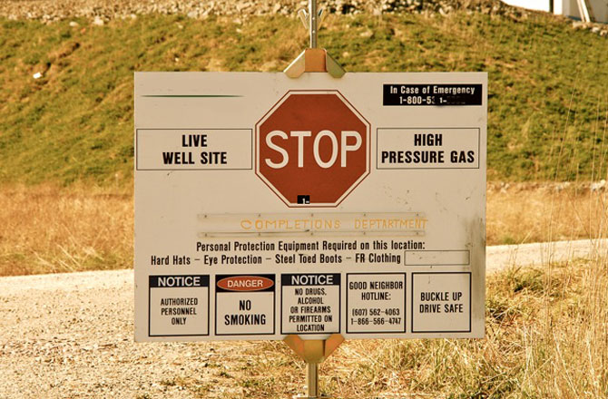 Click to enlarge Fracking site sign in Midwestern US