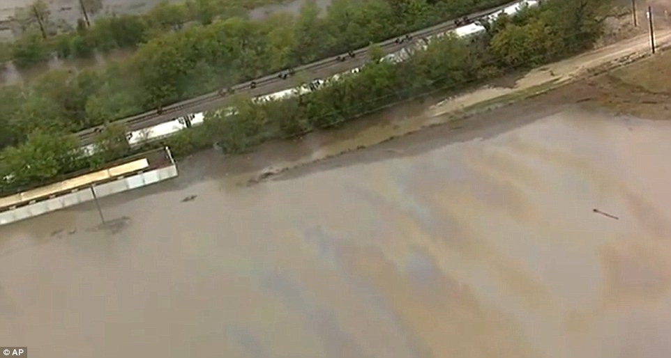 Click to enlarge freight train derailed in Texas floods