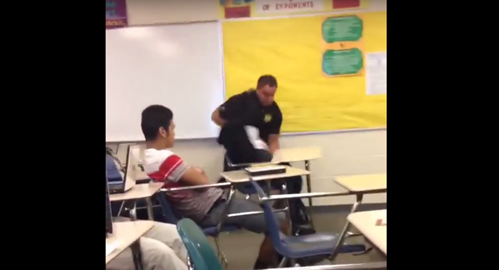 School police officer abuse