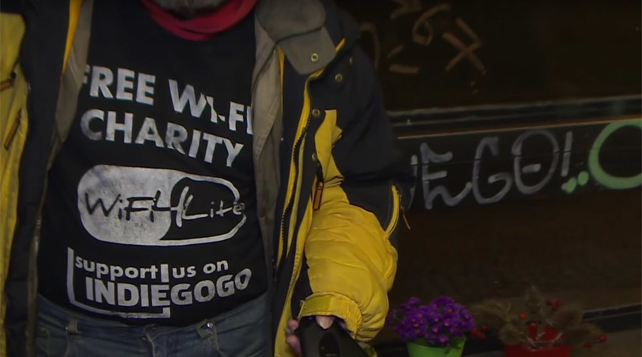 homeless man with Wifi4Life shirt