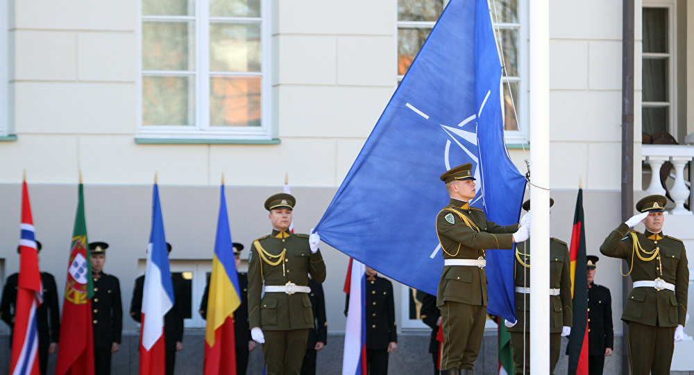Click to enlarge NATO and Lithuanian flags