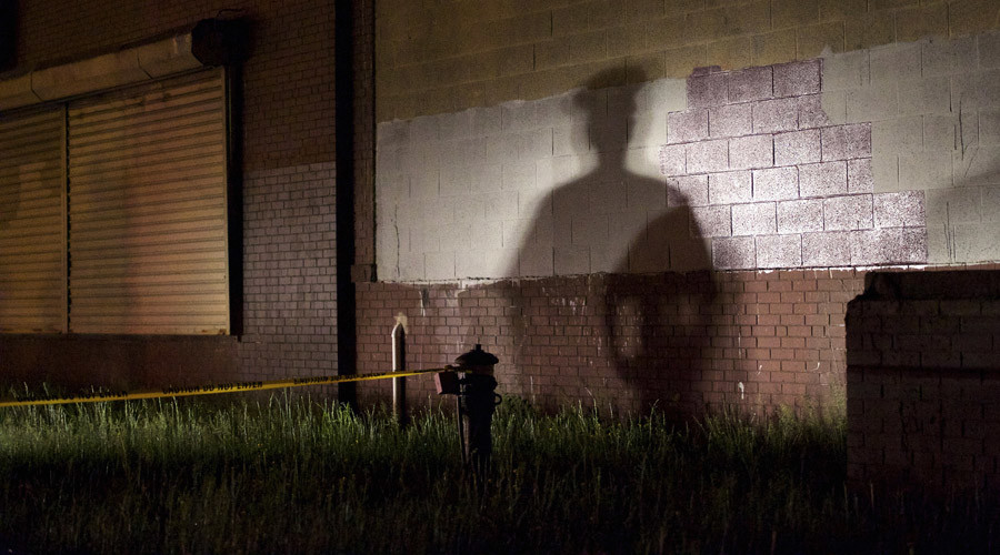 cop shadow at crime scene