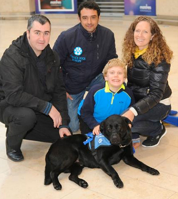 Click to enlarge Service Dogs Europe employees with customers