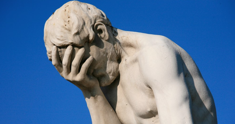 Face palm statue