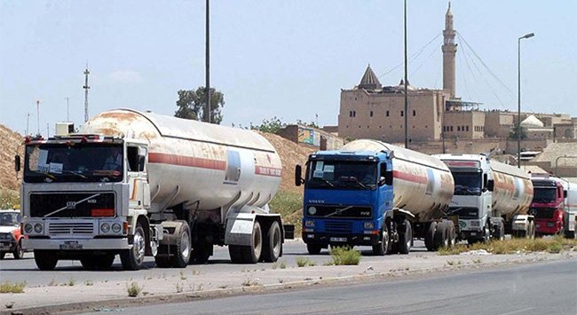 Click to enlarge trucks delivering oil isis turkey