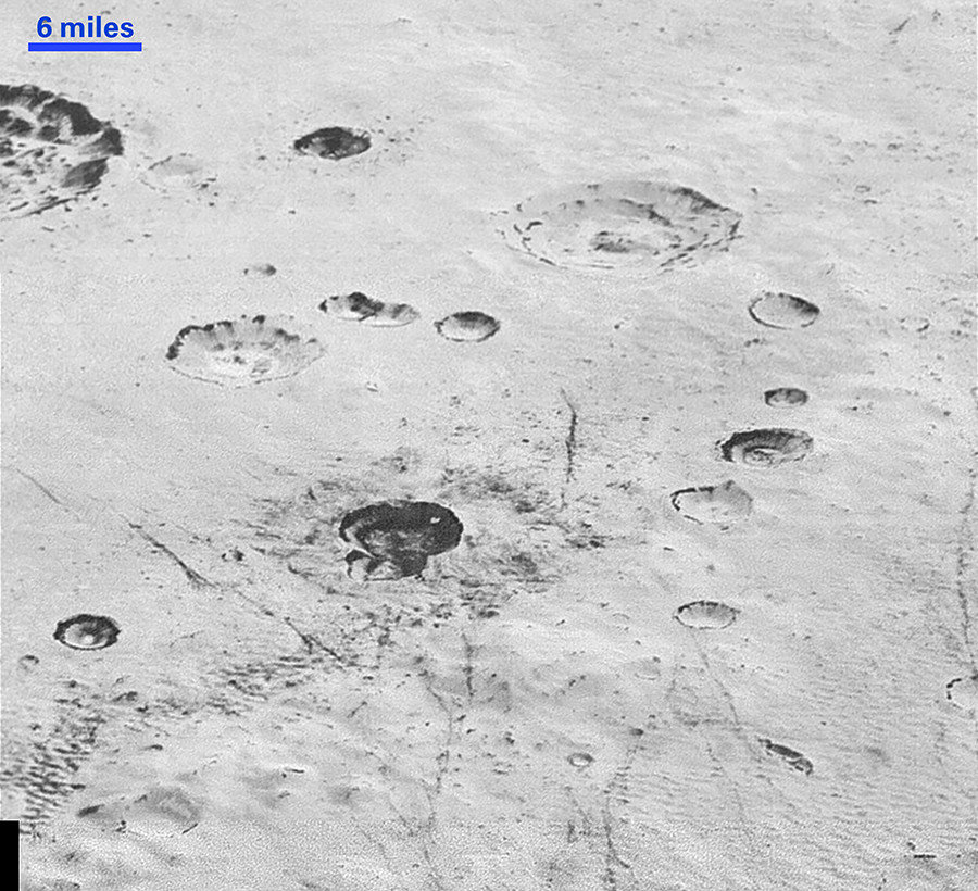 Click to enlarge craters on Pluto